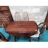 Dark Ercol Oval drop leaf dining table 122cm x 113cm and 4 chairs