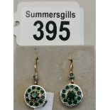 A pair of Emerald and Diamond drop earrings