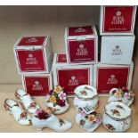 A collection of Royal Albert Ornaments with boxes