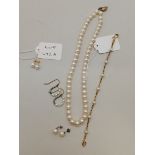 Pearl earrings, bracelet and necklace