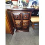 A cabinet with 6 drawers on each in mahogany style