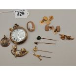A collection of yellow metal and Gold items including cuff links, brooch, pins etc