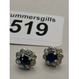 A Pair of Diamond and sapphire Earrings set in 18ct white gold