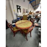 Mahogany and leather top extendable dining table with 4 chairs. 1 central leaf D105cm
