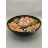 Moorcroft Green Bowl decorated with Hibiscus pattern