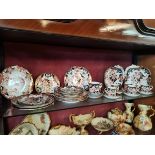 A selection of Crown Derby Plates, Cups, Saucers and serving dishes