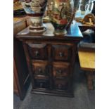 A cabinet with 6 drawers on each in mahogany style