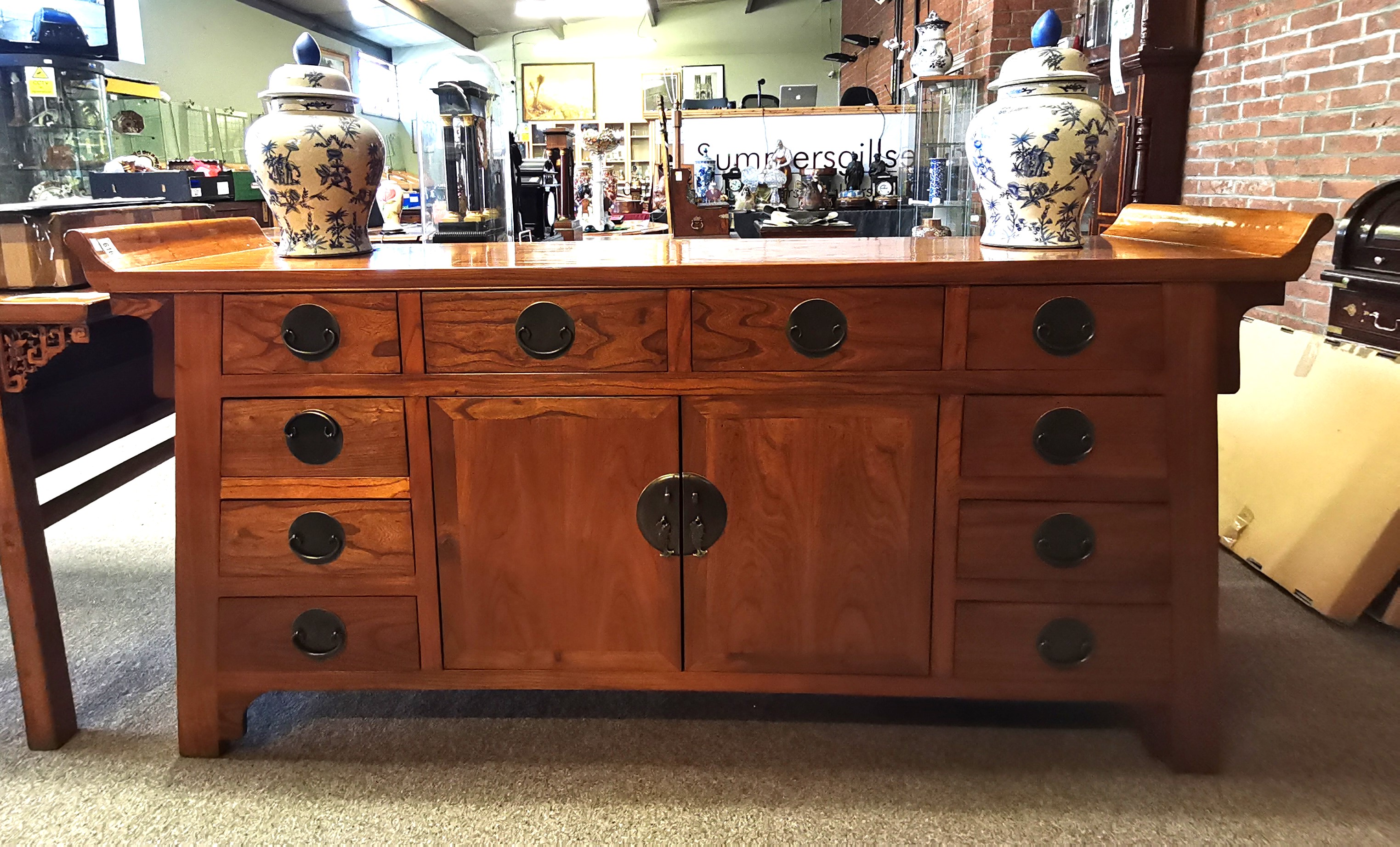 A beautiful Teak Chinese Sideboard with brass handles