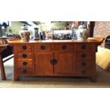 A beautiful Teak Chinese Sideboard with brass handles