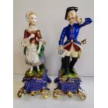 Man and Woman in old continental dress on blue and gilt base
