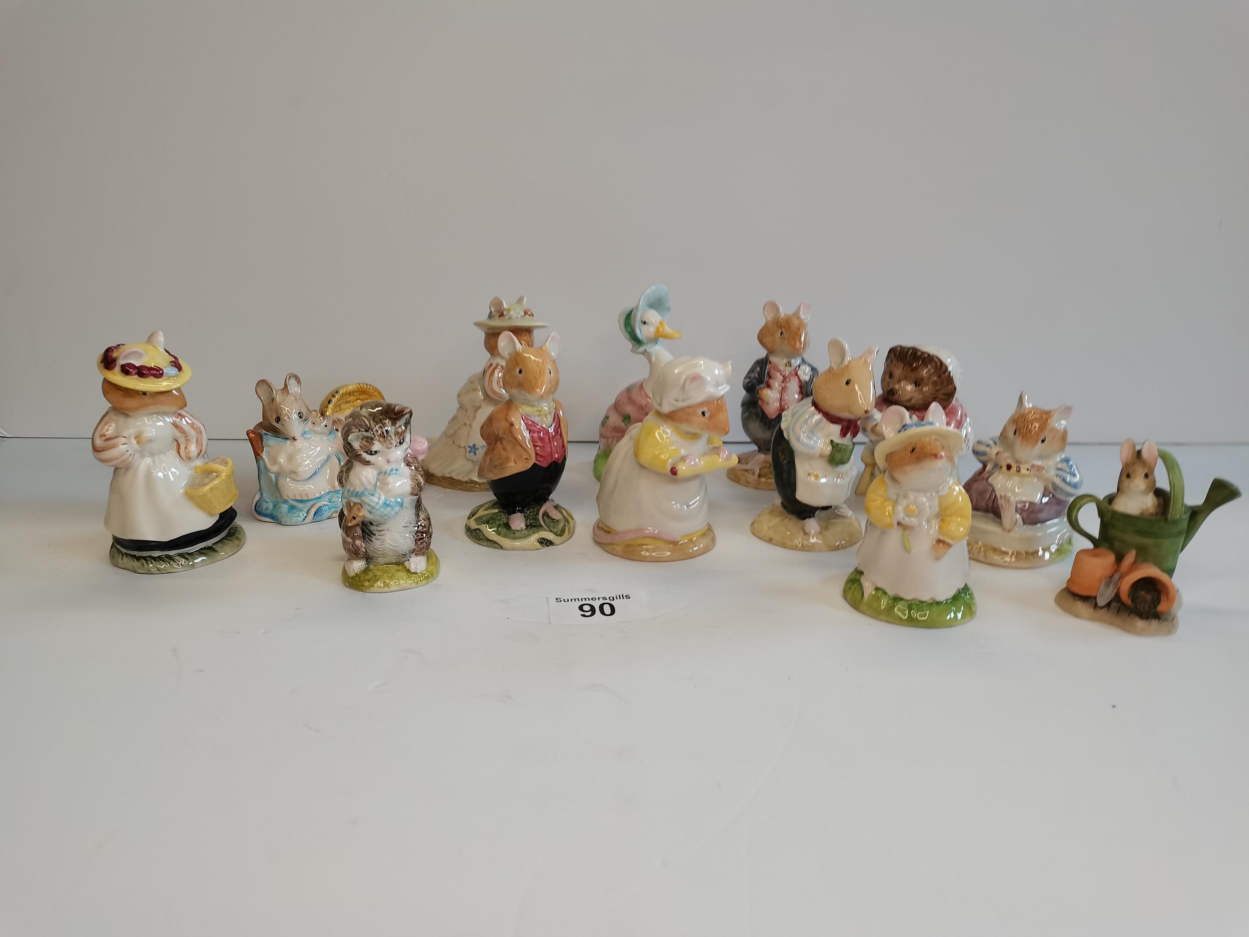 A collection of Royal Doulton, Royal Albert and Beswick figurines