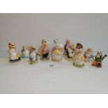 A collection of Royal Doulton, Royal Albert and Beswick figurines