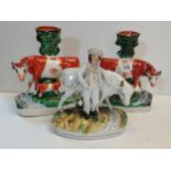 Pair of Staffordshire cow figures plus one