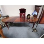 Mahogany Extendable dining table on Casters, 3 leaves