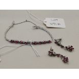 18k white gold and ruby bracelet and matching earrings
