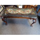 An Antique walnut dressing stool with Queen Anne style legs and tapestry seat