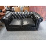 Black leather 2 seater chesterfield settee