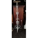 White wrought iron plant stand and Wrought iron display with wicker basket