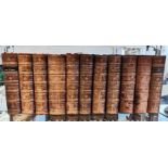Set of 11 leather bound books by Sir Walter Scott