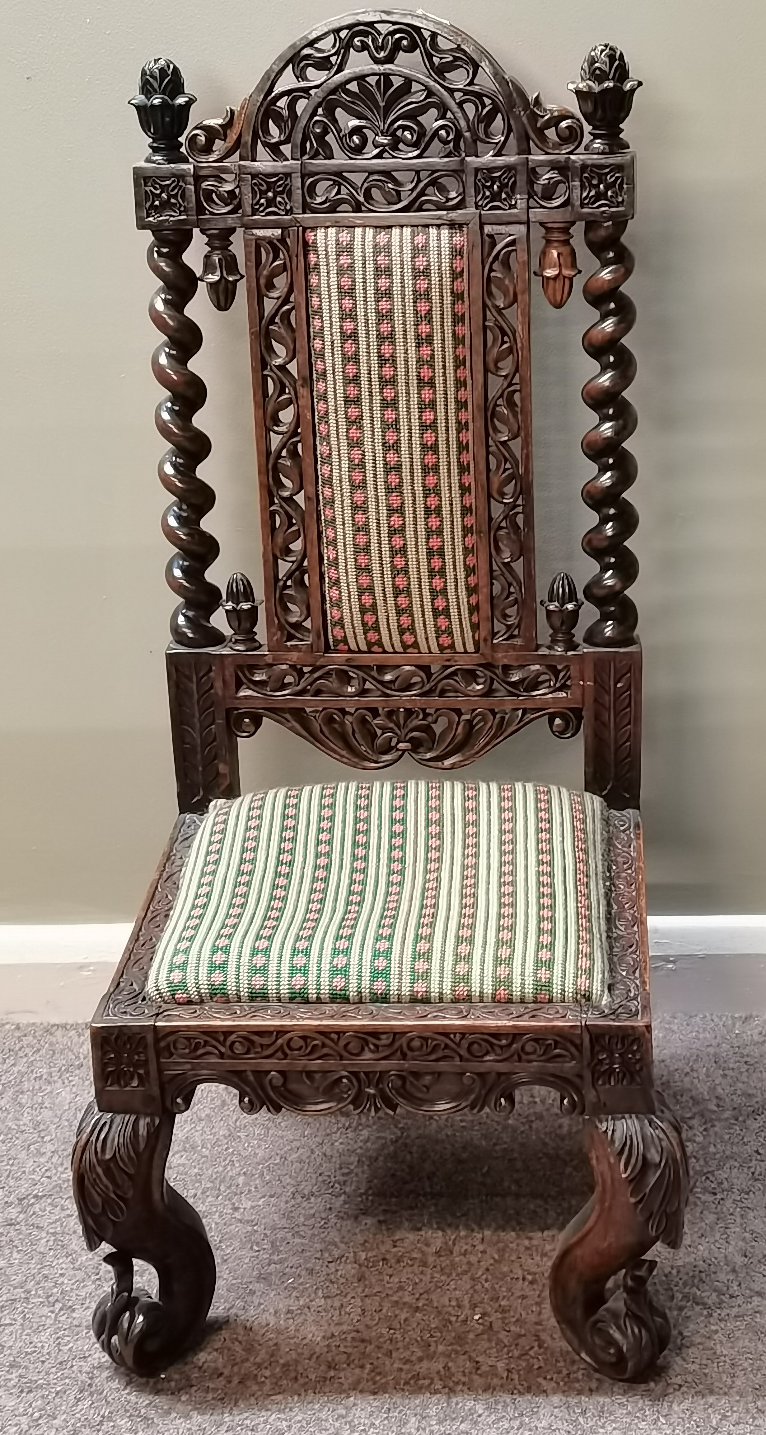 An Antique Anglo Indian Childs chair heavily carved with cabriole legs height 80cm