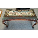 An Antique walnut dressing stool with Queen Anne style legs and tapestry seat