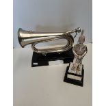 A Royal Hussars trophy given to CAPTAIN M P COLACICCHI 1983 and a silvered bugle presented to Colone