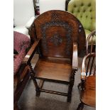 Antique Oak Monks chair with gothic style carving folding to become a table