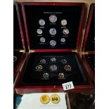 A collection of Elizabeth II coins Gold plated with certificates and original box