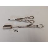 A pair of silver plated scissors and an early London silver dispenser