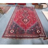 Antique Large blue and red wool rug (worn in places)