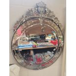 CIrcular wall mirror with decorative edging