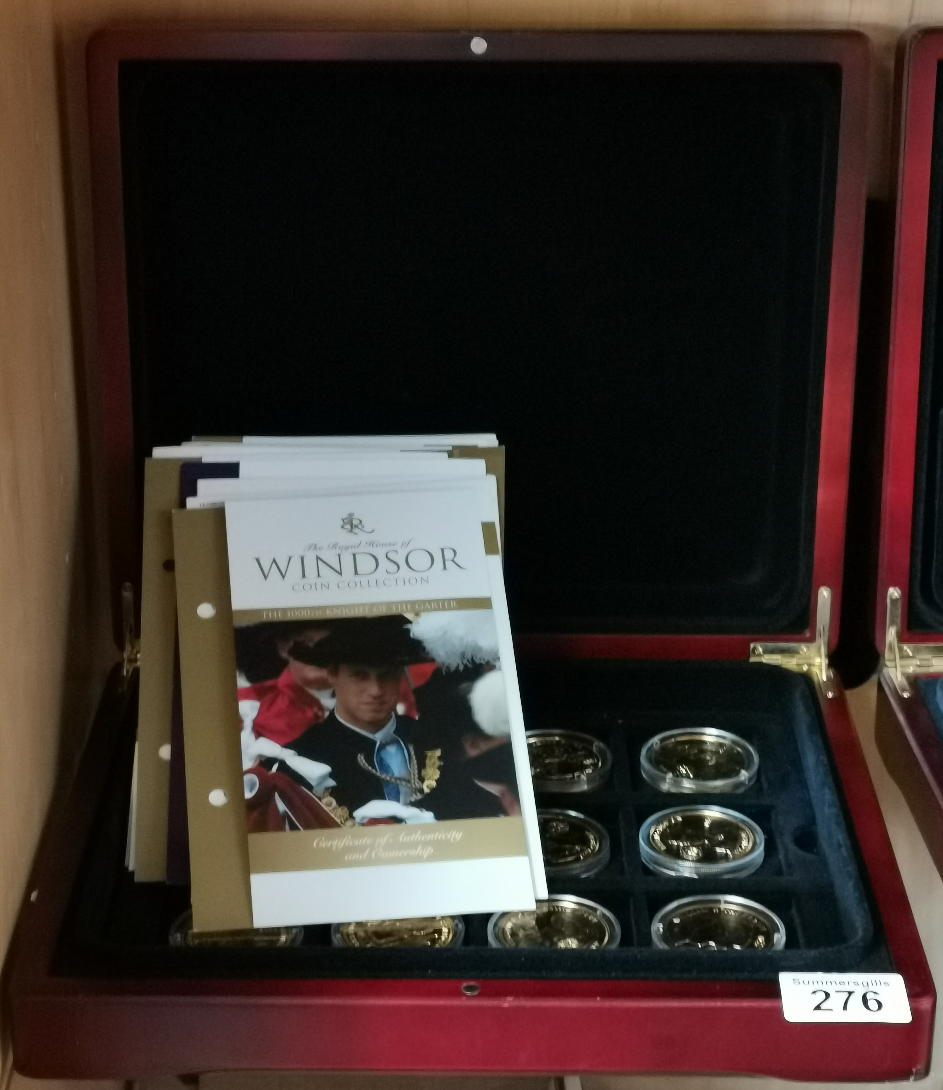 A collection of Elizabeth II coins Gold plated with certificates and original box