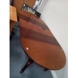 Mahogany Extendable dining table on Casters, 3 leaves