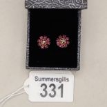 A Pair of Ruby and Diamond earrings