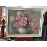 Oil painting of flowers in a vase signed by E.Jowett Edwards
