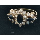 A 9ct gold diamond and sapphire ring 4g total size N