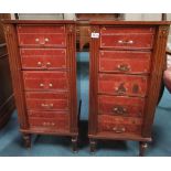 A Pair of 1960s mahogany French Cabinets, each enclosing 5 leather box filing drawers on turn legs a