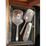 A 3 piece Sheffield silver dressing table set with a glass tray