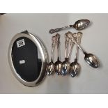 7 Silver teaspoons and silver oval photograph frame