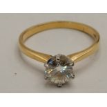 Solitaire 1ct Diamond ring set in hallmarked 750 yellow gold