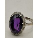 18ct White Gold cocktail ring with Diamonds set around large Amethyst stone