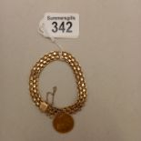 A 14k gold bracelet with 1842 gold sovereign 1842 attached 32g total