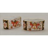 Pair of Royal Crown Derby napkin rings marked XLII