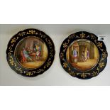 A pair of Blue-du-Roi serves Plates each painted with Interiors & Figures by Teniers (one A/F with c