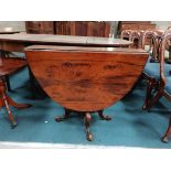 Mahogany oval double drop leaf table with claw feet