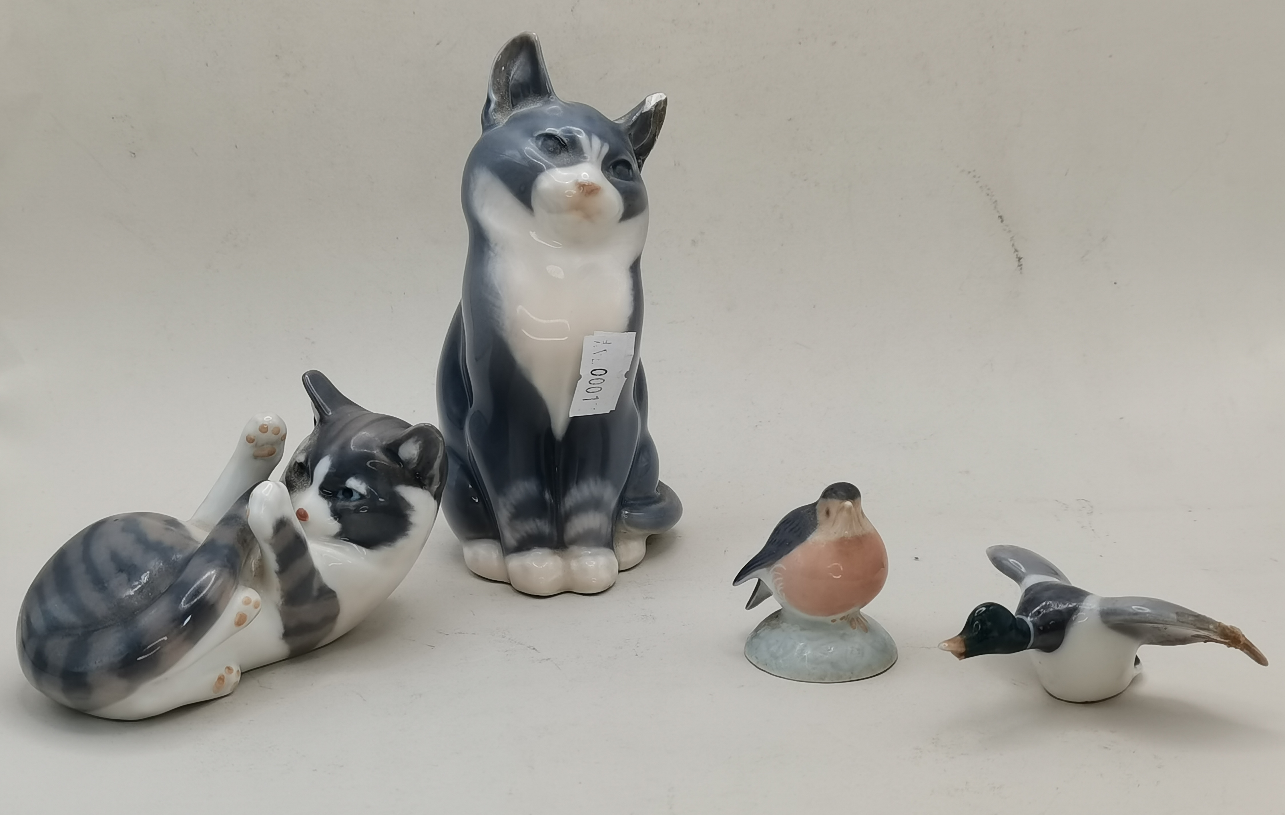 4 x Royal Copenhagen figures - 2 x cats, duck and bird (A/F)
