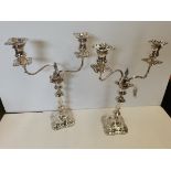 An outstanding pair of solid silver candelabras Sheffield