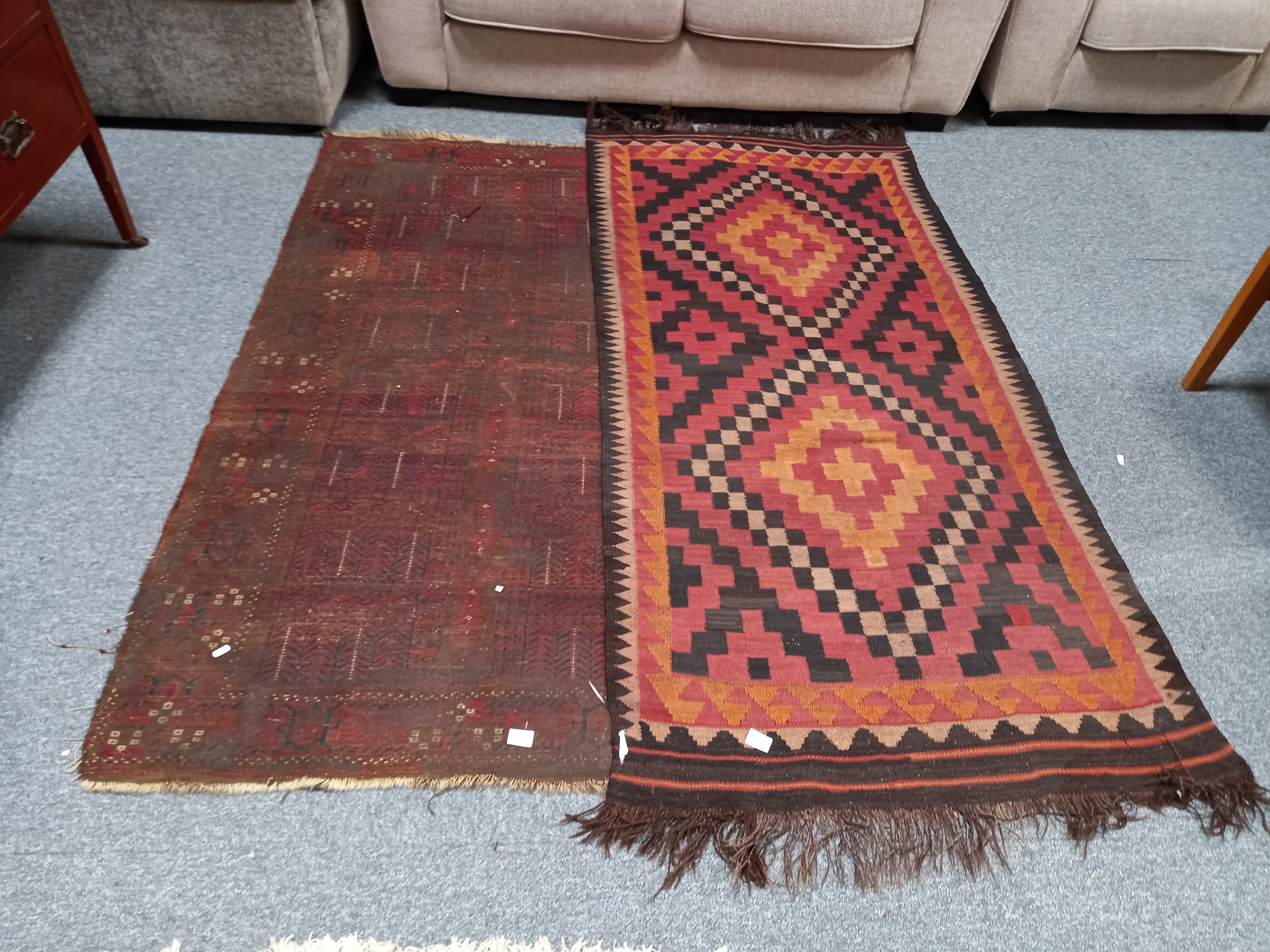 x2 rugs in worn condition