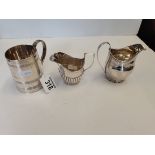 2 x silver cream buds 166g plus a London silver mug presented to J P Colcicchi 193g