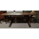 An early oak refectory table with x shaped framed legs 1.8m long x 85cm w height 75cm